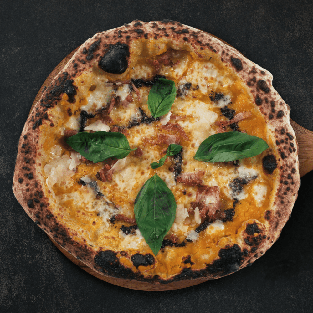 Fotografía de una pizza Guanciale e Tartuffo elaborada en Gussa Pizzería Gandia | Obrador Napolitano | Pizza Napolitana