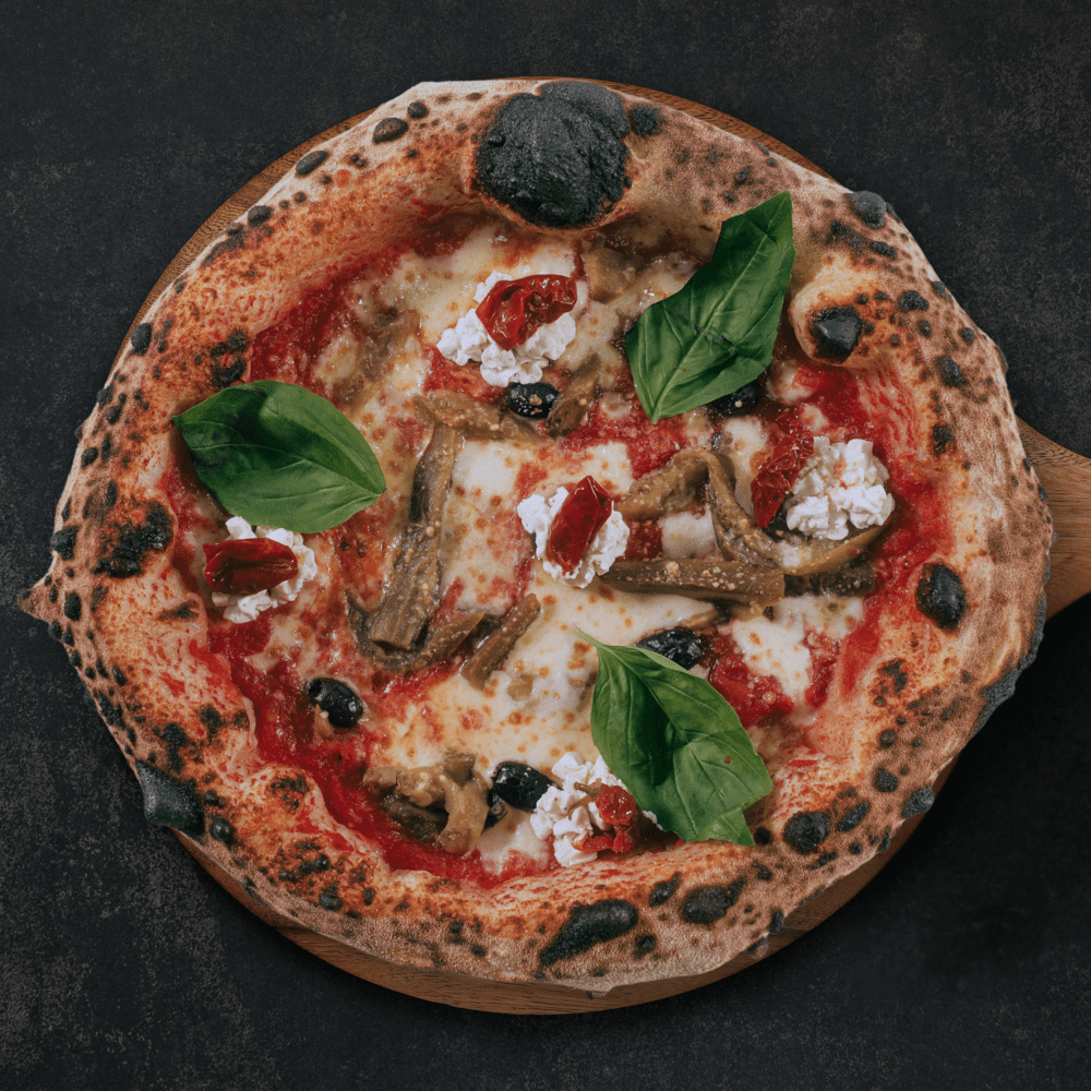 Fotografía de una pizza Ortolana elaborada en Gussa Pizzería Gandia | Obrador Napolitano | Pizza Napolitana