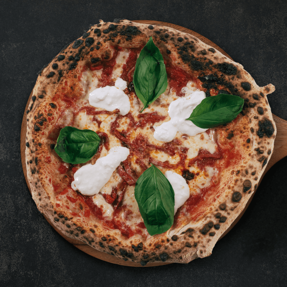 Fotografía de una pizza Vulcano elaborada en Gussa Pizzería Gandia | Obrador Napolitano | Pizza Napolitana
